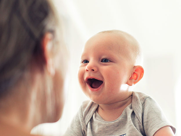 Baby looking at mom